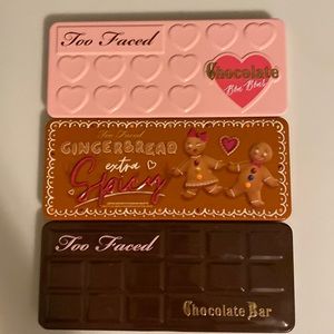 Three Too Faced Eye Shadow Palettes.